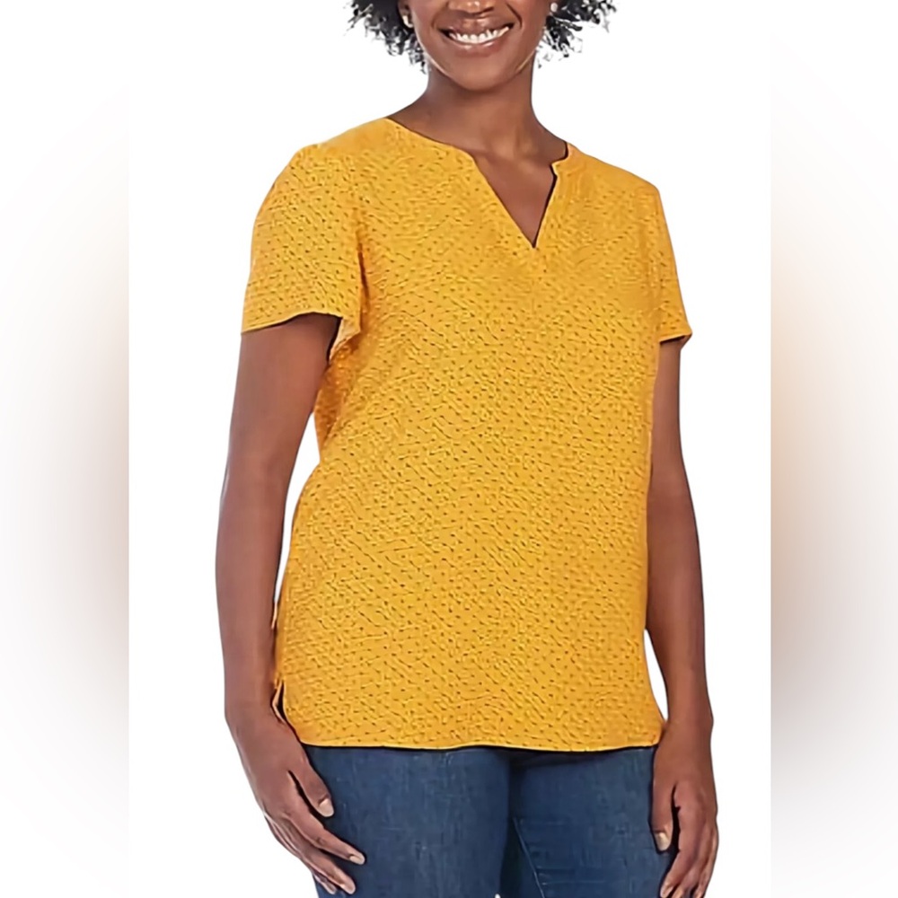 Yellow short sleeve blouse with cute v-neckline and polka dots! Size Medium.
